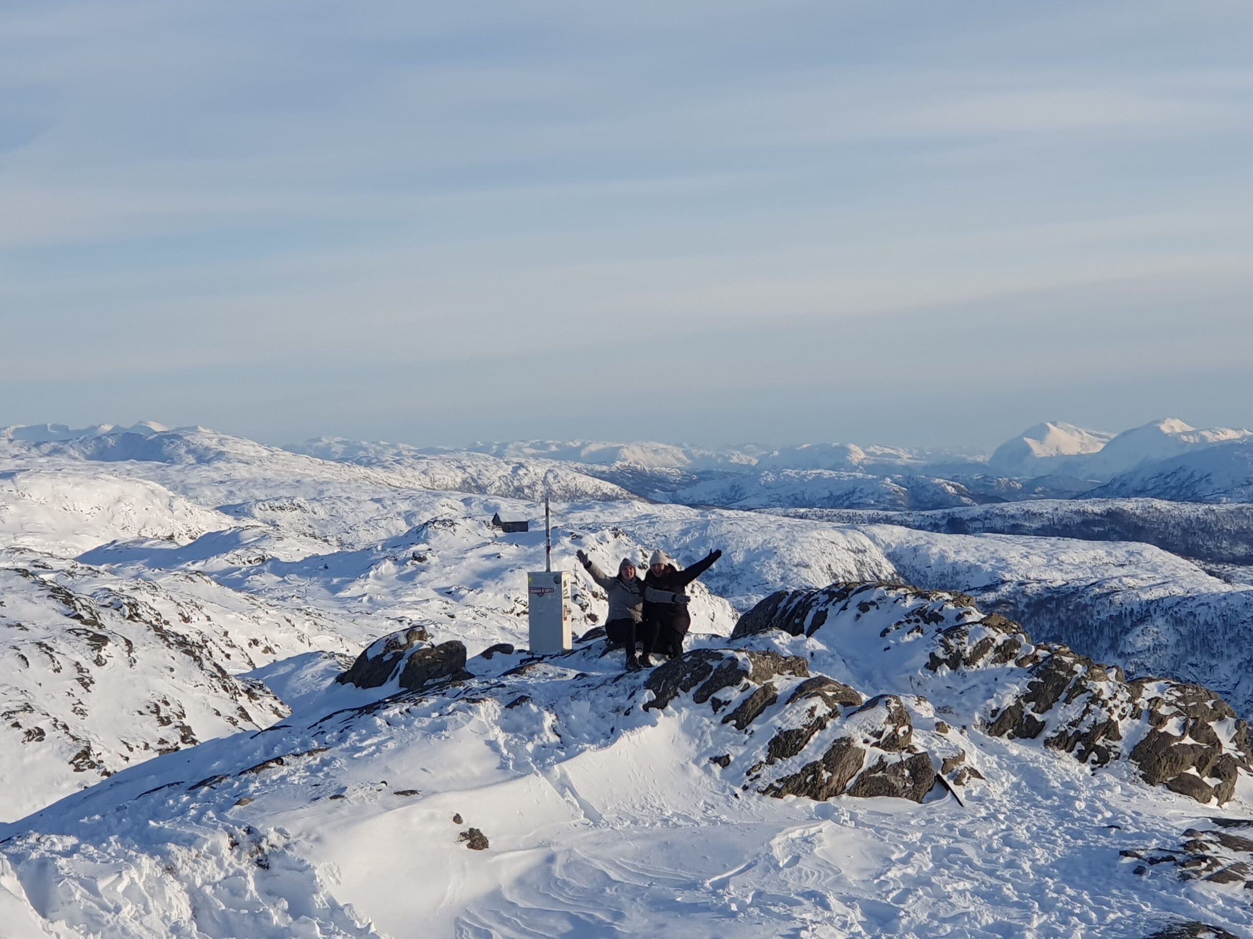 Alison and friend on a mountain